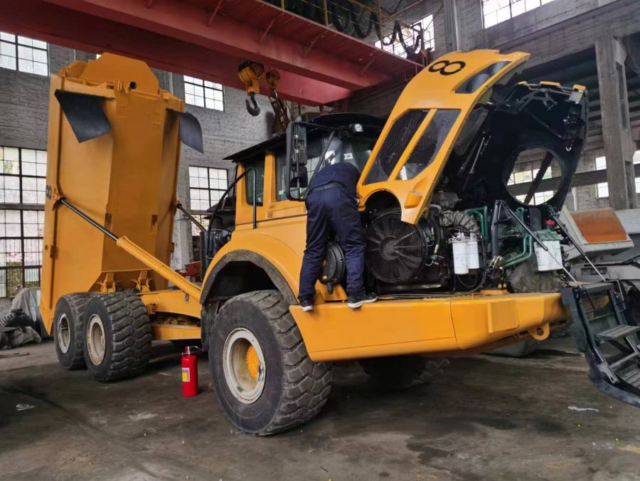 1718246521129024.jpg 铰接式自卸卡车.jpg